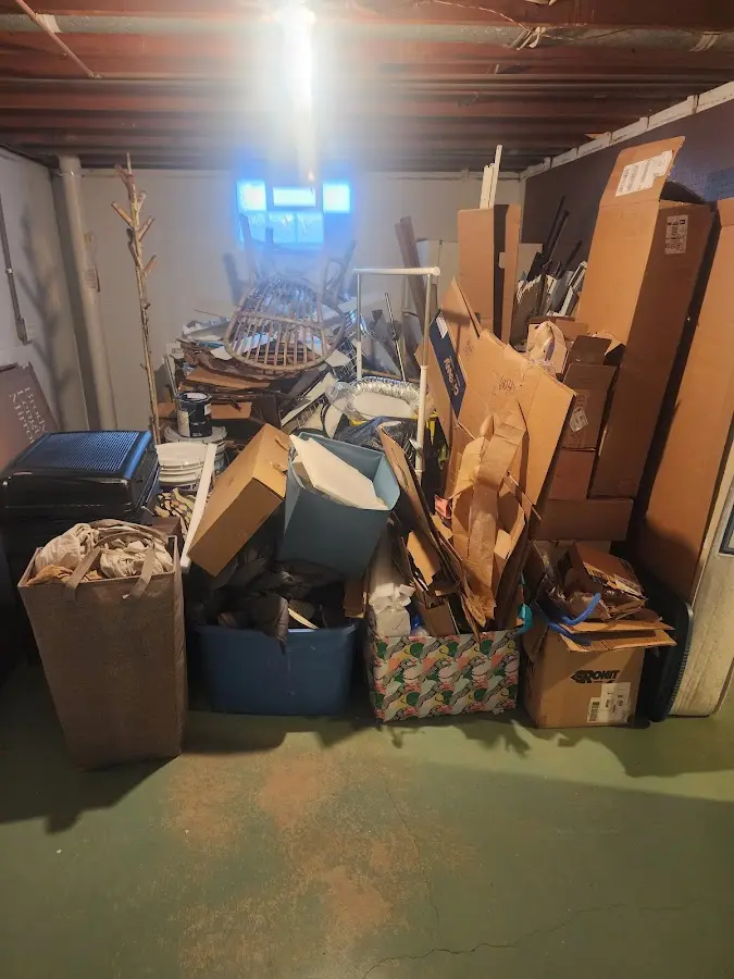 Roll-off dumpster container at job site for 2 Yard Dumpster Rental in Kent